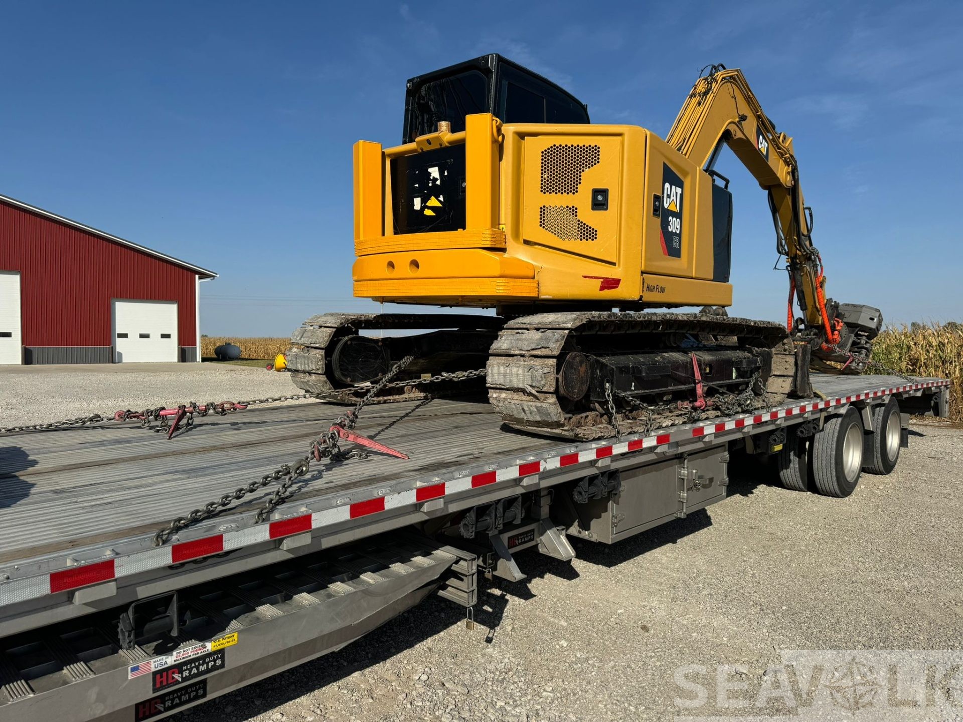 CAT 309 Mini Excavator loaded for transport