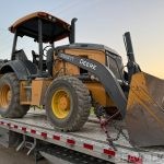 John Deere 310L Backhoe Loader — USA to South Africa — cargo photo 1
