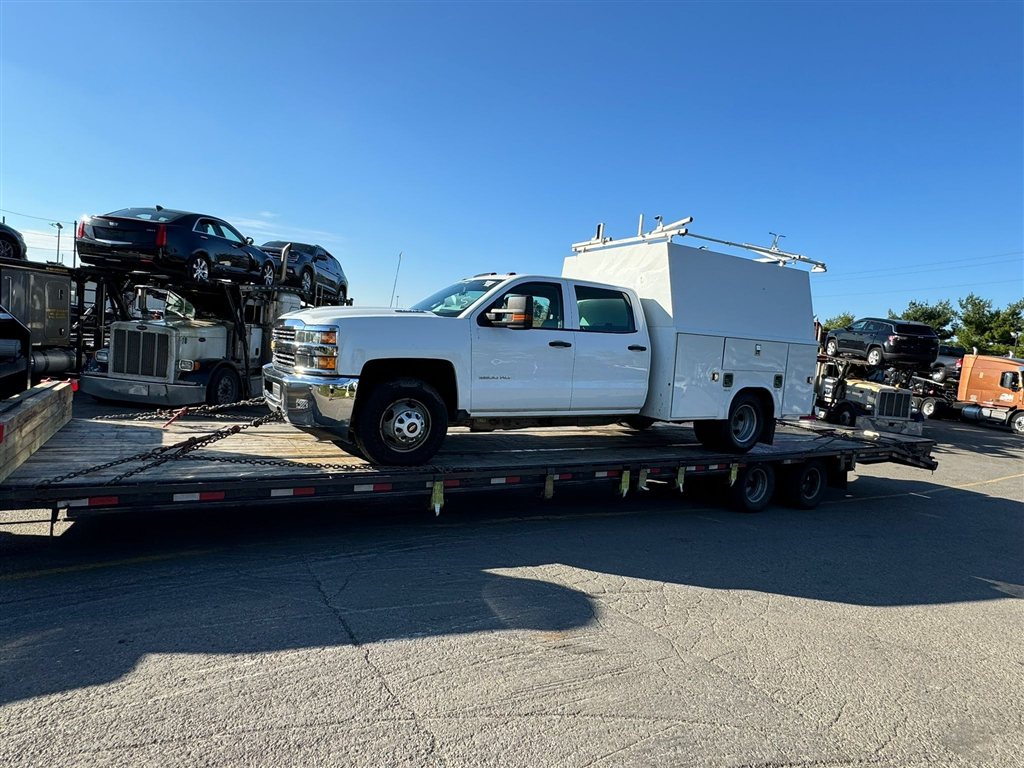 Chevrolet Silverado 3500HD Utility Truck — USA to Ghana — cargo photo 1