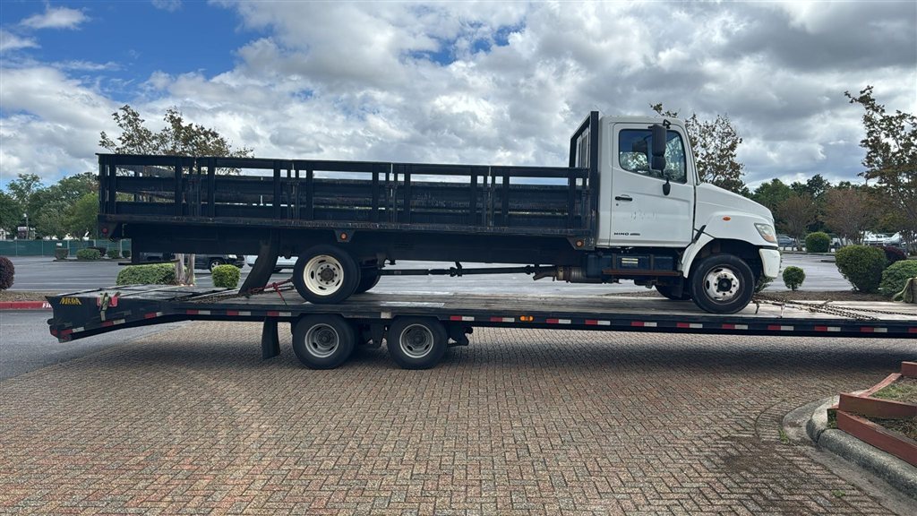 Hino Flatbed Truck — USA to Honduras — cargo photo 1