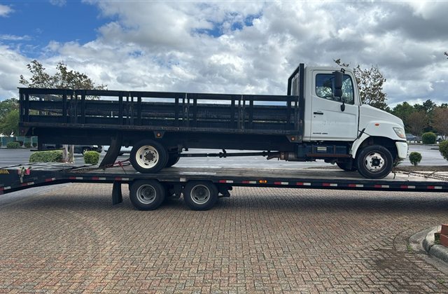 Hino Flatbed Truck — USA to Honduras — cargo photo 1