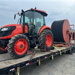 Kubota M7060 Tractor and Irrigation Hose Reel — USA to Mexico — cargo photo 1
