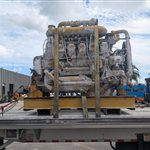 Caterpillar Open-Frame Generator — An exposed Caterpillar diesel power assembly is supported within a steel frame.