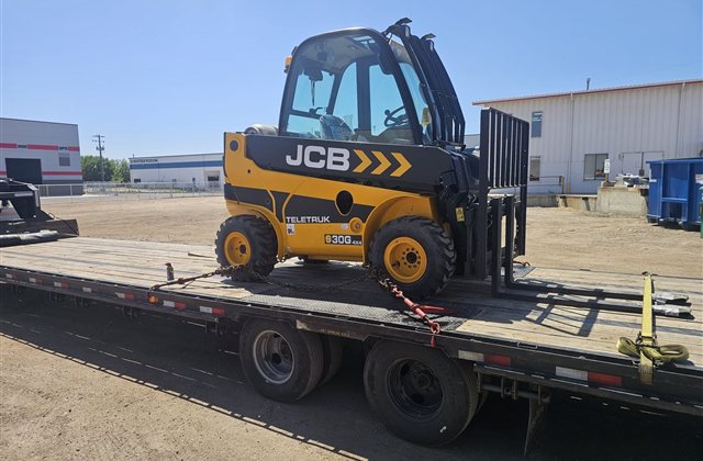 JCB TLT 30G Teletruk: A telescopic-boom forklift photographed as a complete wheeled machine